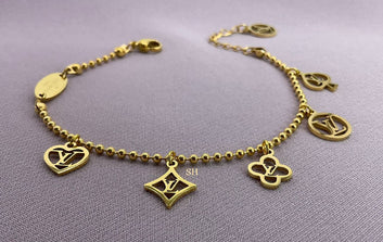 LV Gold Charm Bracelet with Iconic Symbols