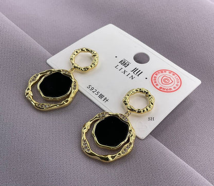 Gold Drop Earrings with Black Enamel and Textured Crystal Accents